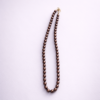 Elegant brown pearl single strand beaded necklace mala by Elysian Elite