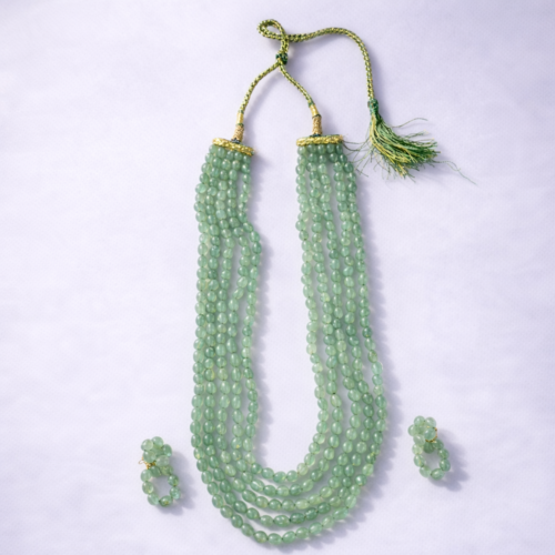 Mint green multi strand beaded statement necklace set with matching earrings by Elysian Elite
